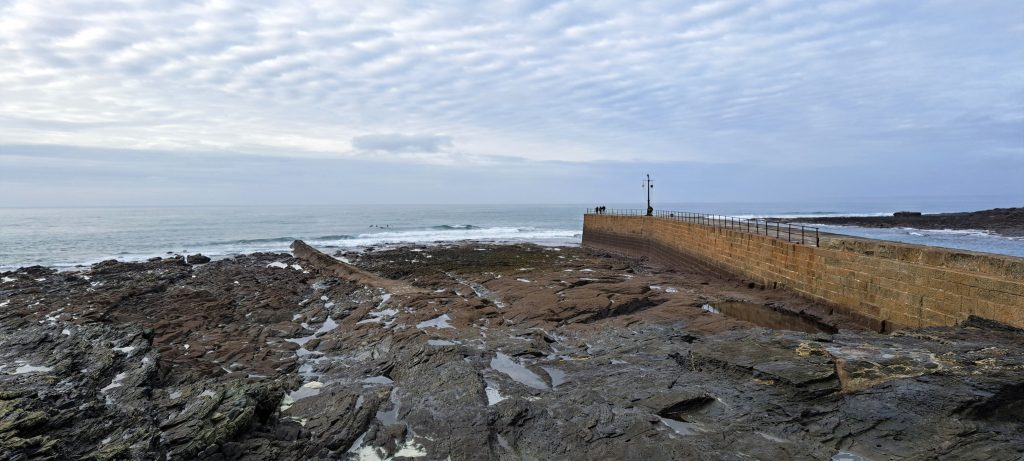 The breakwater at Porthleven harbour front